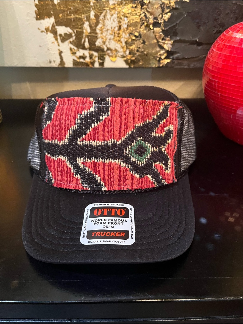 OTTO Black Trucker Hat with Red Patterned Front and Green Accent